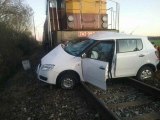 Dopravná nehoda nákladného vlaku a osobného vozidla