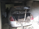 Požiar osobného automobilu v garáži rodinného domu v obci Chtelnica